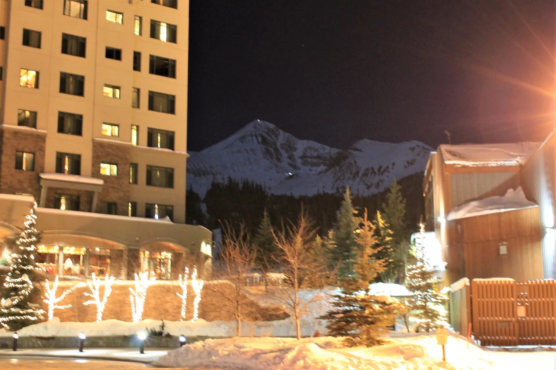 Lone Peak above the illuminated village at Big Sky Resort