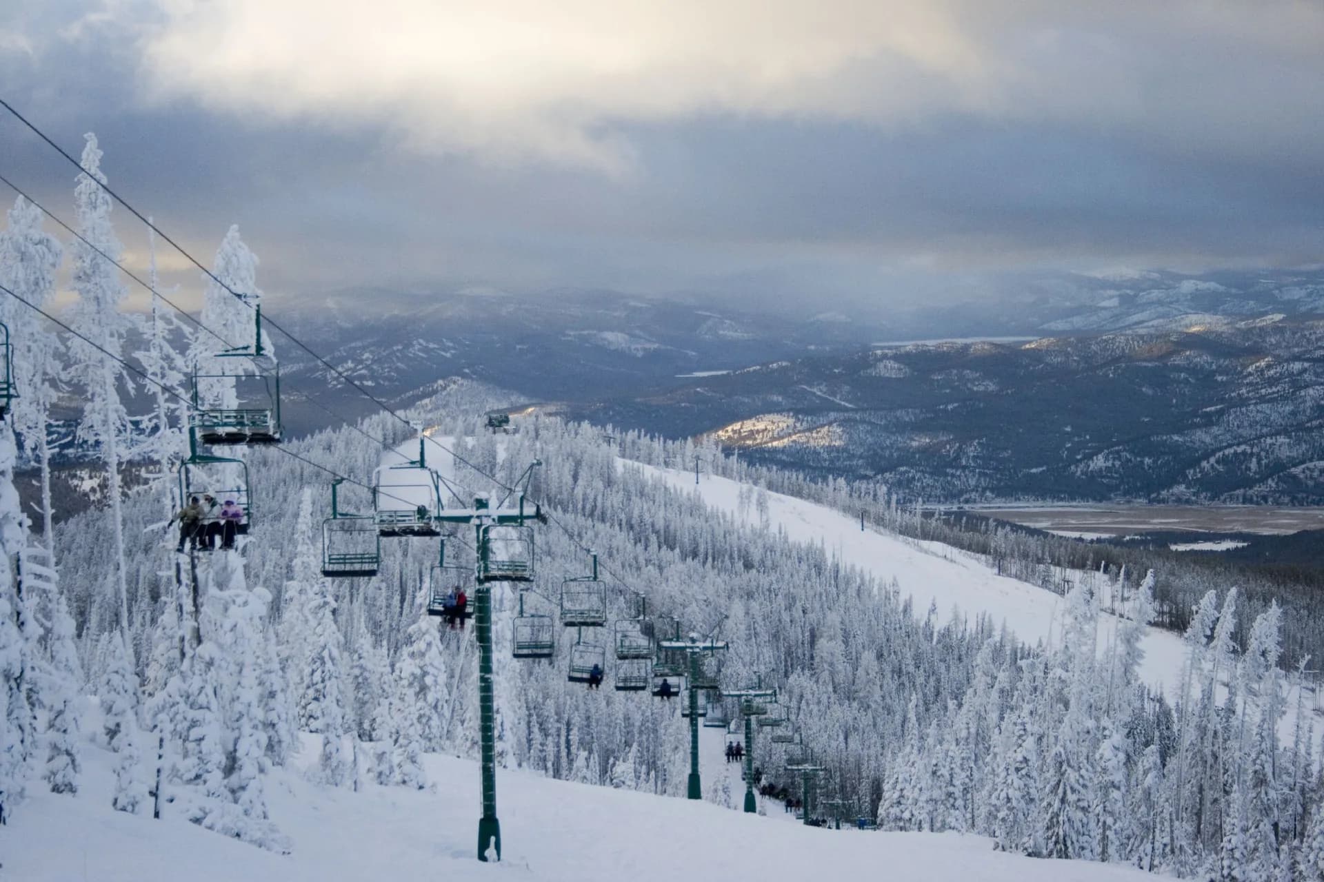 Snowy ski slope and chairlift at Blacktail Mountain